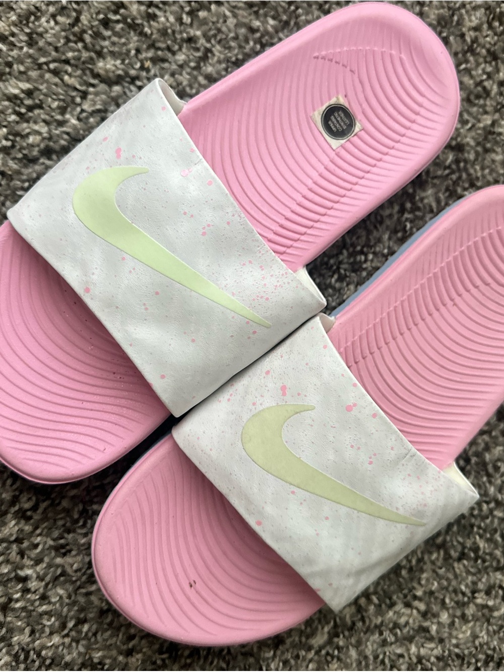 Nike Pink Slide Sandals with Pale Yellow Swoosh and White Strap
